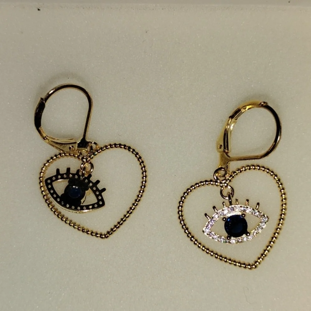 Gold Tone Heart Eye Earrings